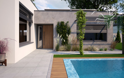 RealityDS – Predaj pozemku 803 m² so starším rodinným domom a projektom 4-izbového bývania s dvojgarážou | Blatná na Ostrove